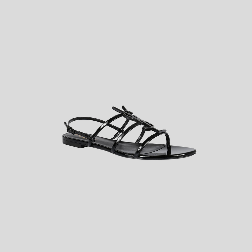 サンダル・ミュール [ SAINT LAURENT]PATENT LEATHER CASSANDRA FLAT SANDALS SAINT LAURENT Cassandra logo-embellished patent-leather